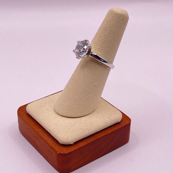 Two (2) carat cz solitaire in a 925 sterling silver setting. Size 6.25. - Picture 14 of 14